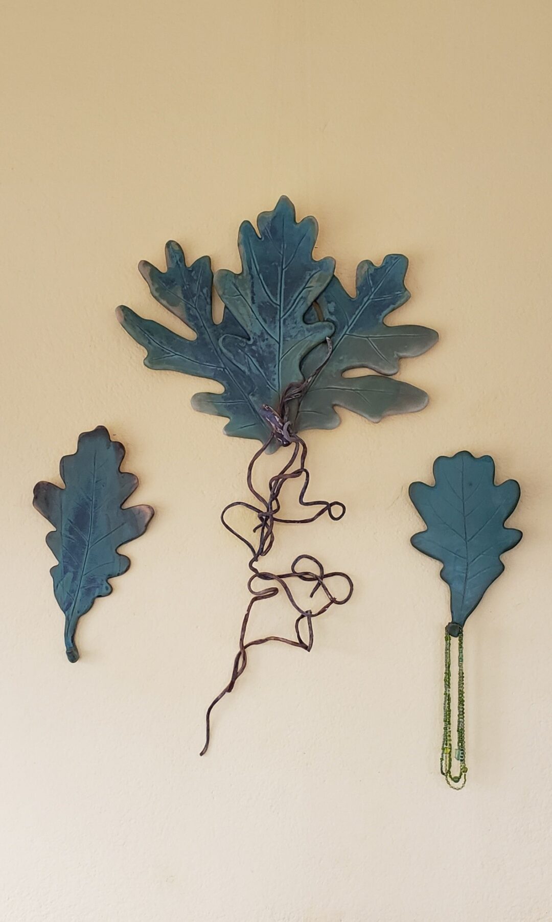 Three oak leaf wall pieces