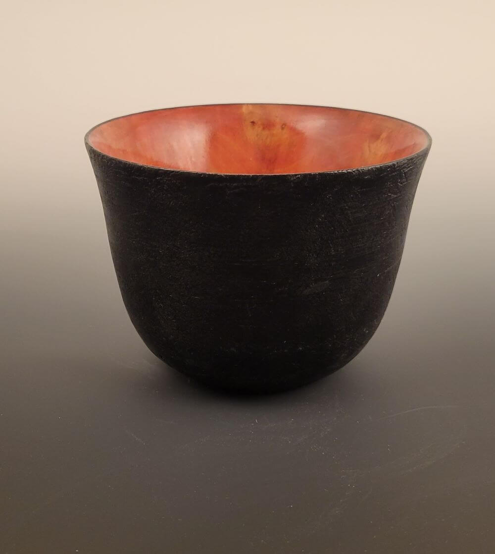 Poplar bowl with natural cranberry dye interior and India ink 'leather' effect exterior