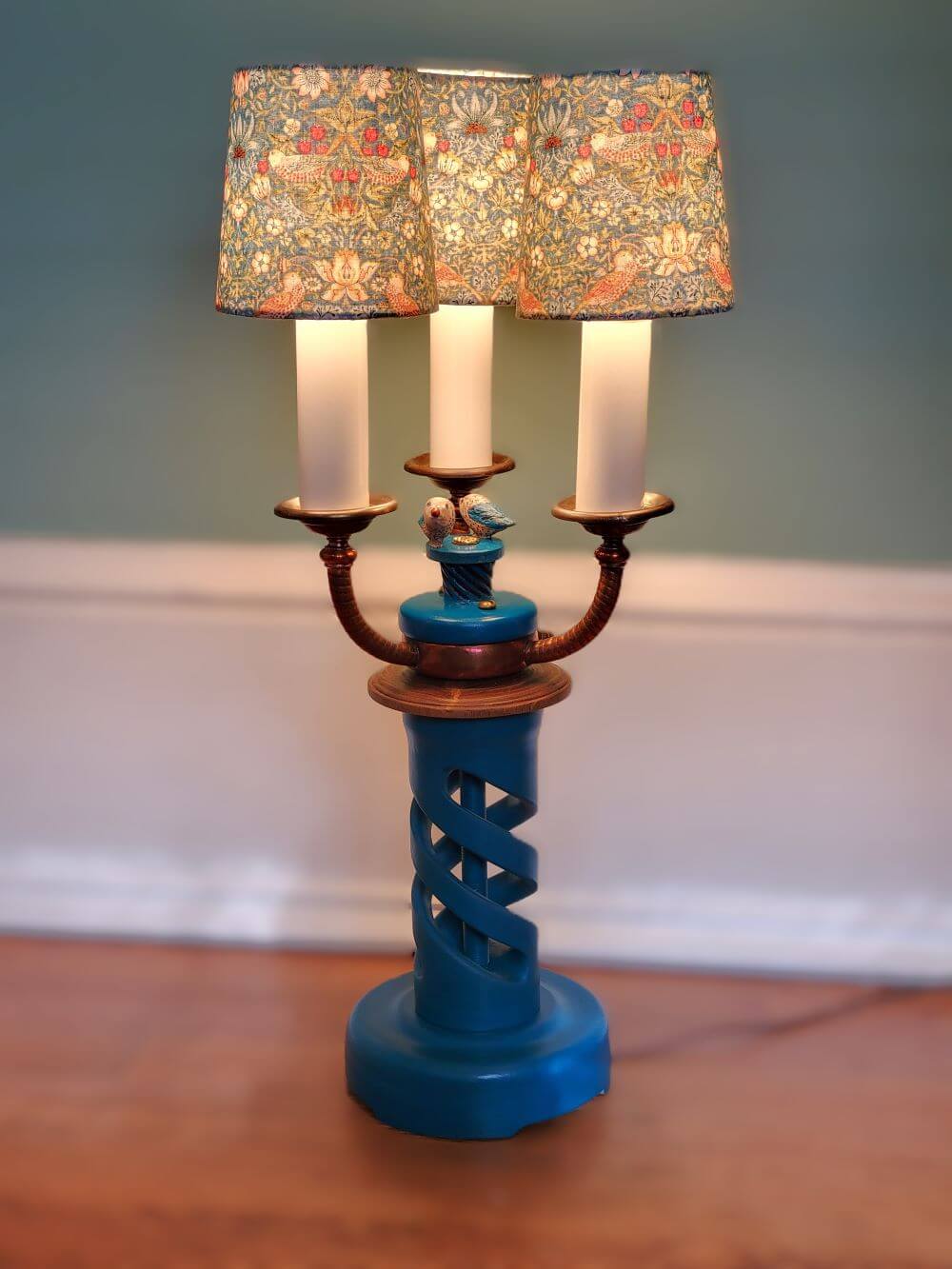 Turned and carved lamp with carved birds & metal medallion, custom shades and repurposed hardware.