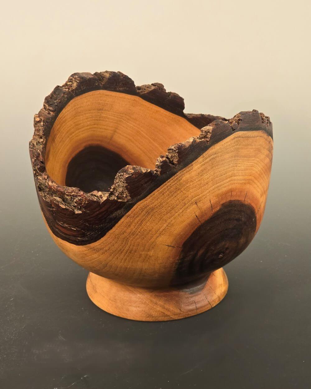 Walnut pedestal bowl with natural edge